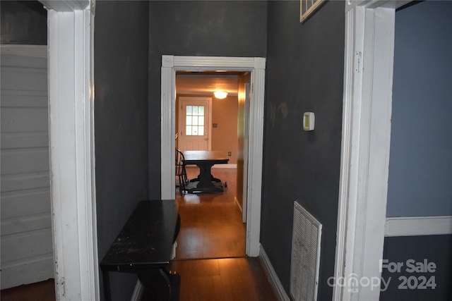 hallway featuring hardwood / wood-style flooring