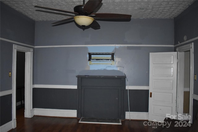 kitchen with ceiling fan and wood-type flooring