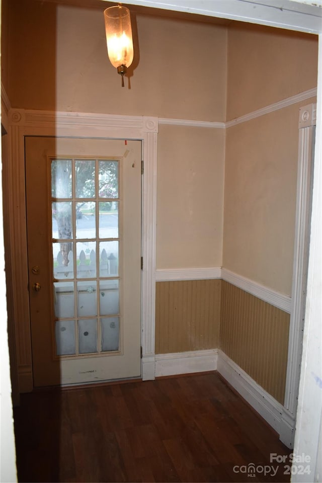 entryway with wood-type flooring