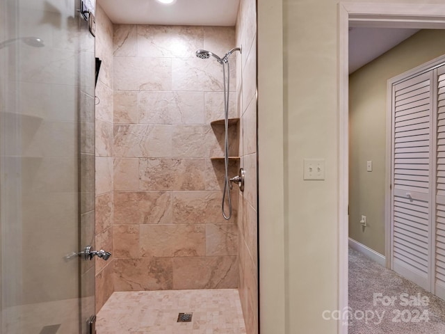 bathroom featuring an enclosed shower