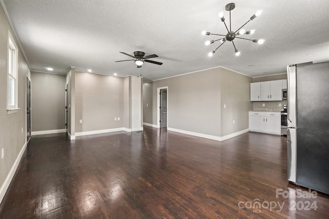 unfurnished living room with dark wood-style floors, a textured ceiling, ceiling fan with notable chandelier, and baseboards