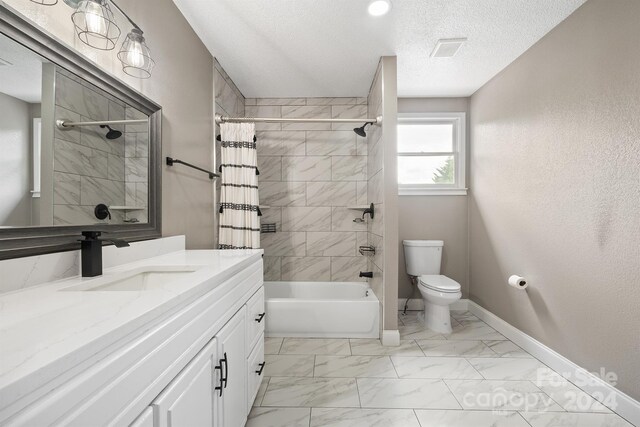 full bathroom featuring tile patterned floors, a textured ceiling, vanity, toilet, and shower / bathtub combination with curtain