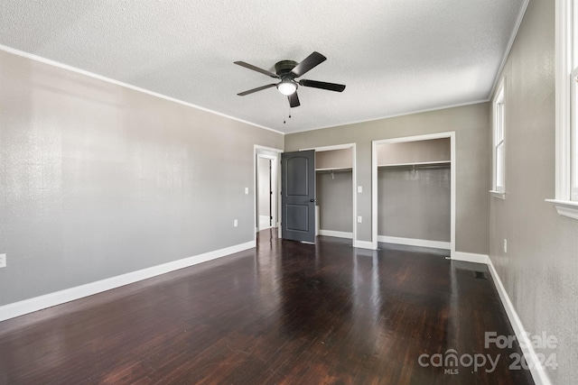 unfurnished bedroom featuring a textured ceiling, ceiling fan, and hardwood / wood-style floors