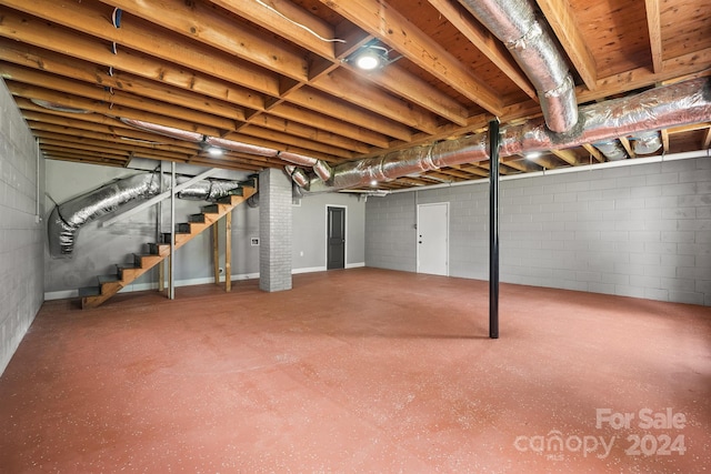 unfinished basement with stairs