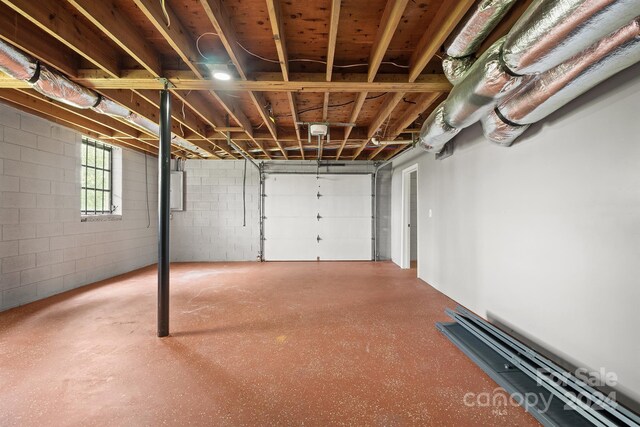 basement with electric panel