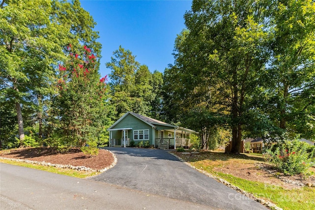 view of front of property featuring covered porch