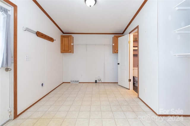 interior space with crown molding