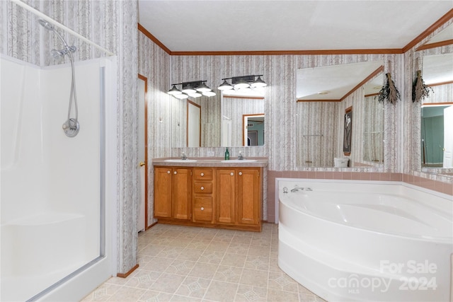 bathroom featuring crown molding, vanity, separate shower and tub, and tile patterned floors