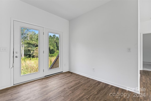 empty room featuring dark hardwood / wood-style floors