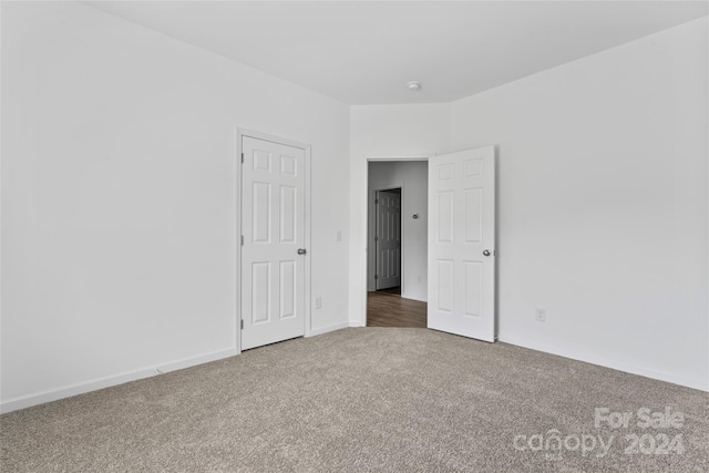 spare room featuring carpet flooring