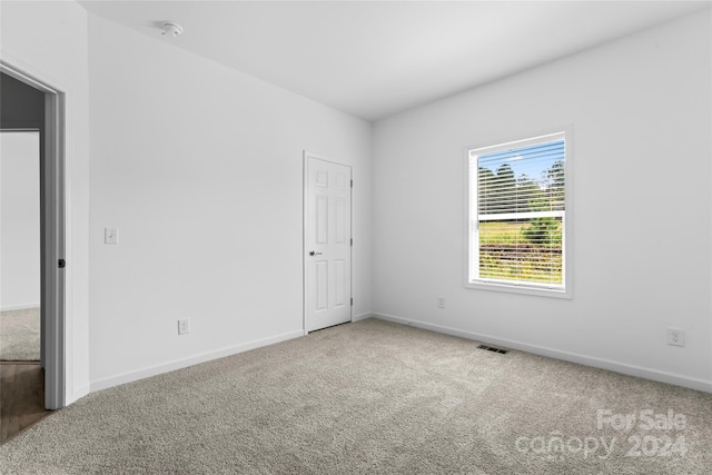 empty room featuring carpet