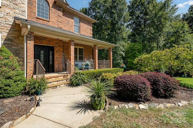 entrance to property with covered porch