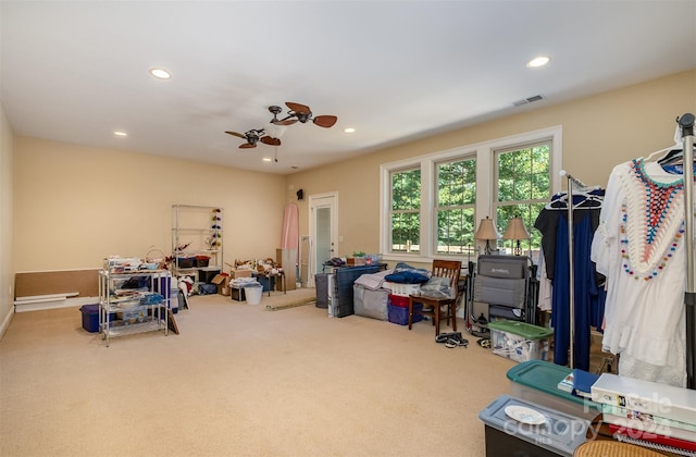 interior space featuring carpet floors, ceiling fan, visible vents, and recessed lighting