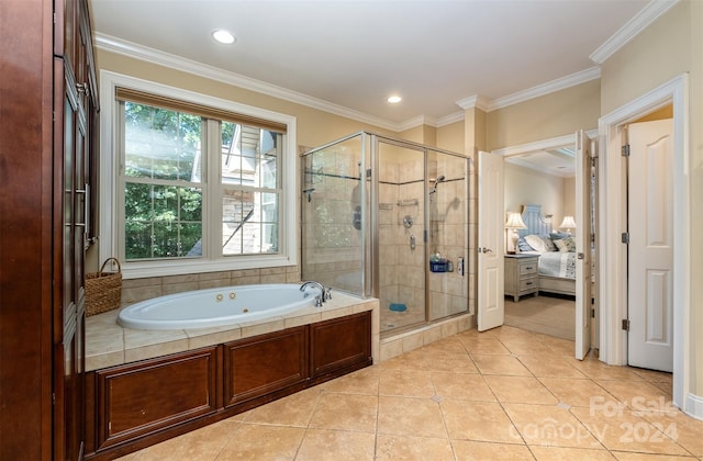 full bath with a tub with jets, ensuite bathroom, tile patterned flooring, crown molding, and a shower stall