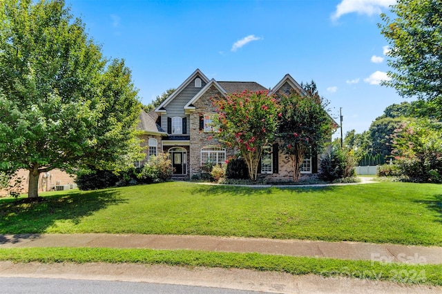 view of front of house with a front yard