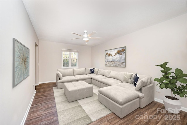 living room with hardwood / wood-style flooring and ceiling fan