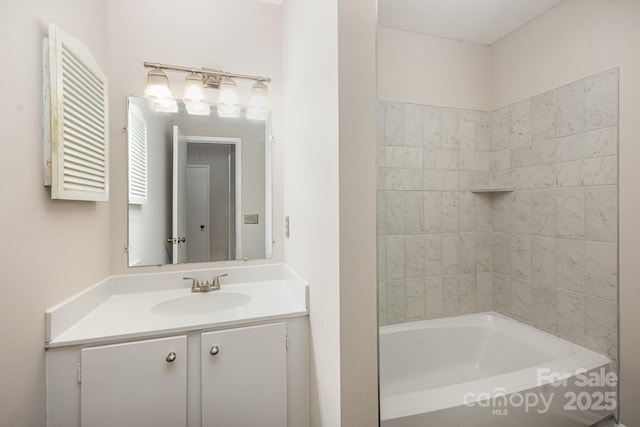 bathroom with vanity and a bathtub