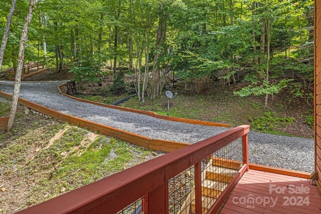 exterior space featuring a wooden deck