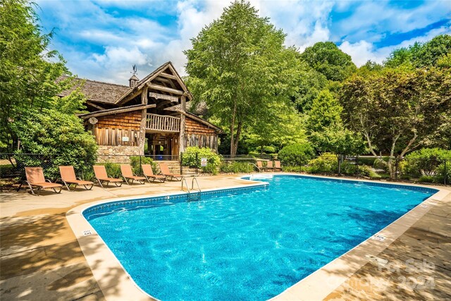 view of pool with a patio area