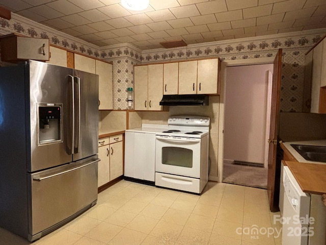 kitchen with ornamental molding, wallpapered walls, white appliances, and range hood