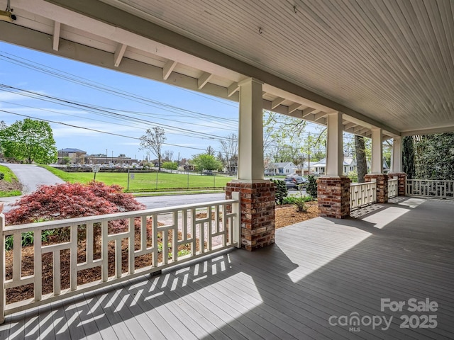 wooden deck featuring a porch