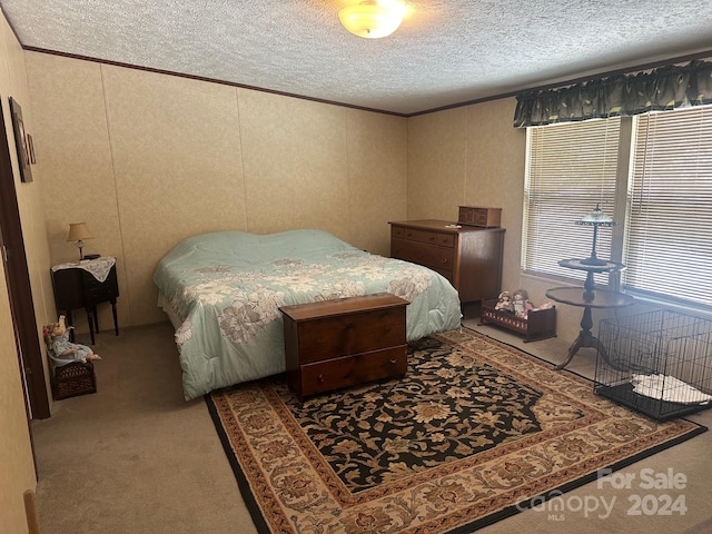 bedroom with light carpet, crown molding, and a textured ceiling