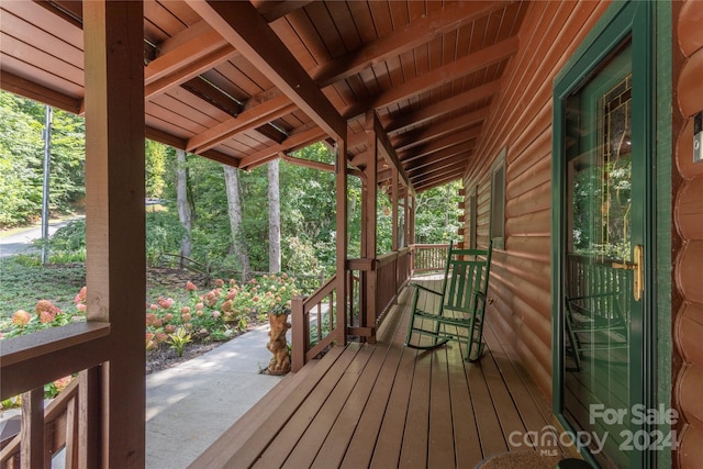 wooden deck featuring a porch