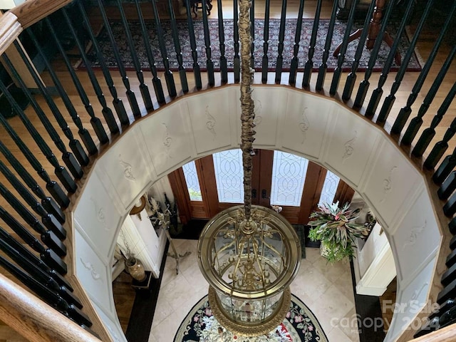 staircase with french doors