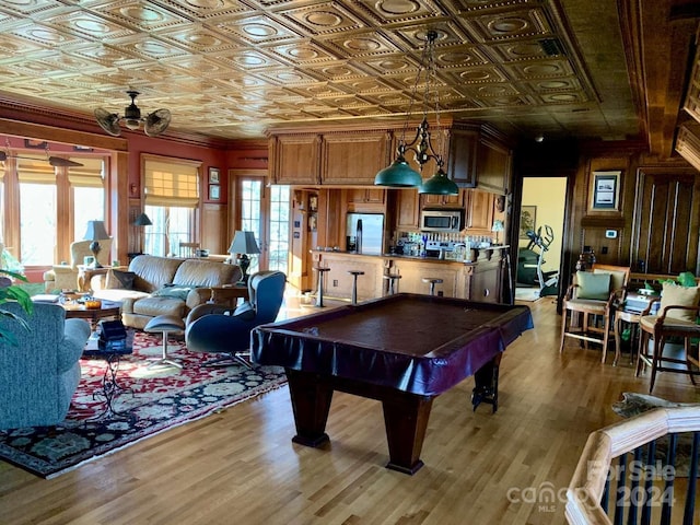 playroom featuring a wealth of natural light, pool table, and wood-type flooring