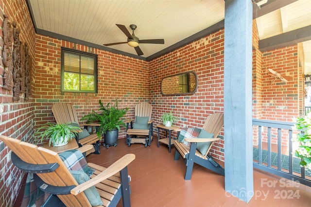 view of patio / terrace with a porch and a ceiling fan