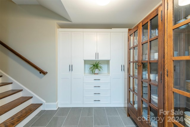 interior space featuring dark tile patterned floors and french doors