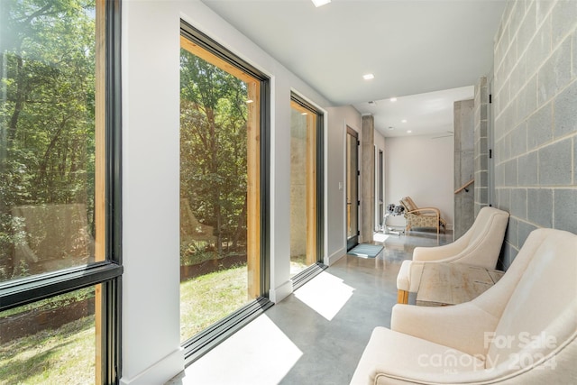 sunroom featuring plenty of natural light