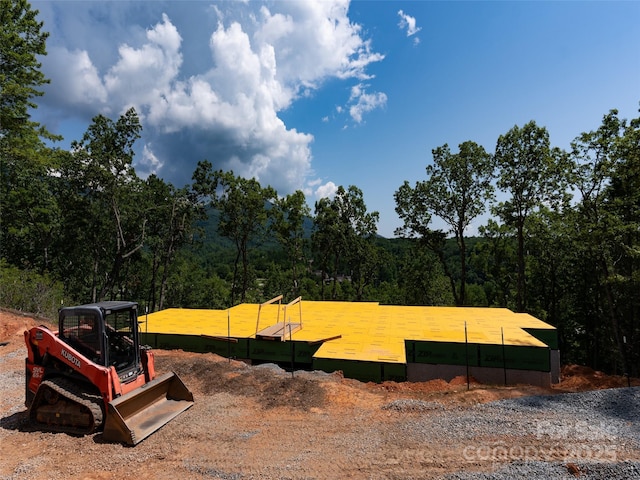 2015 Deep Gap Farm Rd W, Mill Spring, NC 28756 - view of yard featuring a forest view
