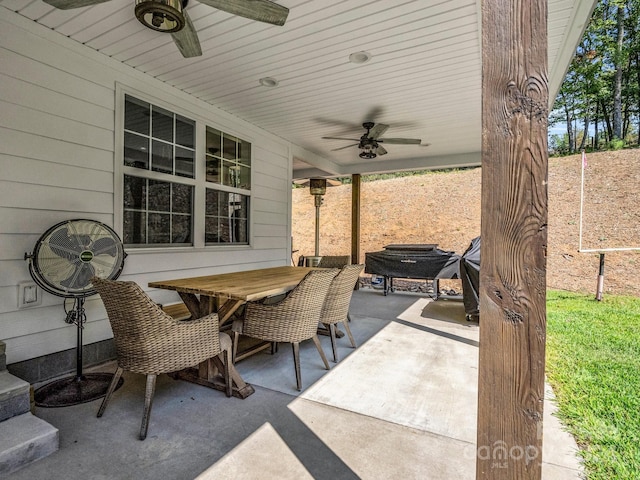 view of patio / terrace featuring outdoor dining space and a ceiling fan