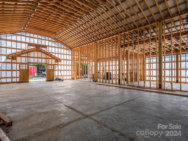 miscellaneous room with high vaulted ceiling