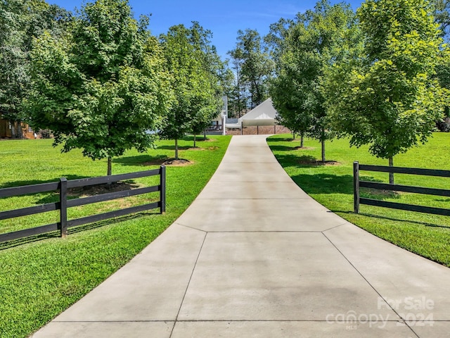 surrounding community with a yard