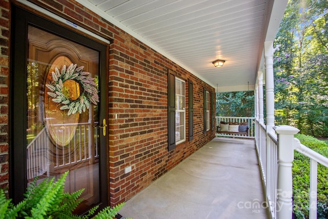 view of patio featuring a porch