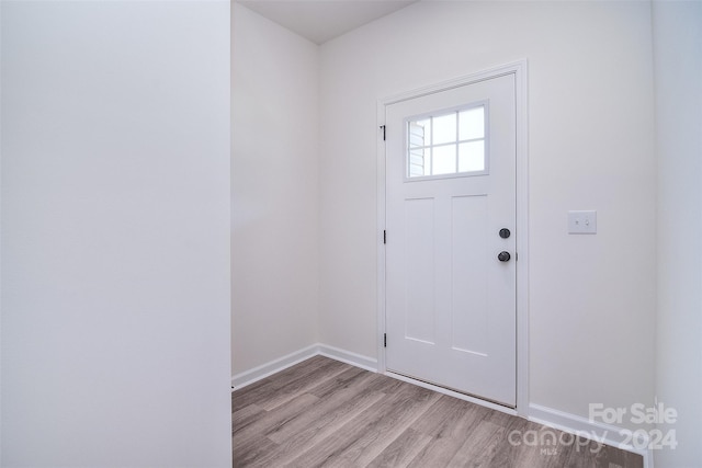 foyer with light wood-type flooring