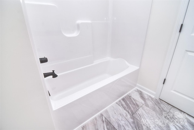 bathroom with tile patterned floors