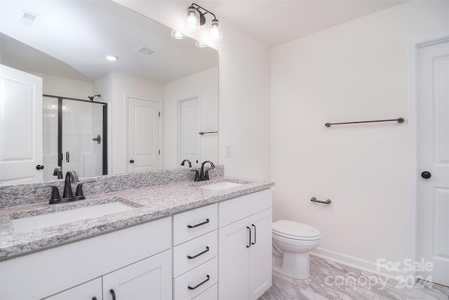 bathroom featuring tile patterned flooring, an enclosed shower, toilet, and vanity