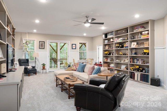 carpeted living room featuring a ceiling fan and recessed lighting