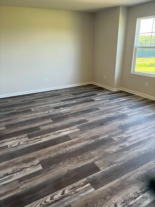 spare room featuring hardwood / wood-style floors