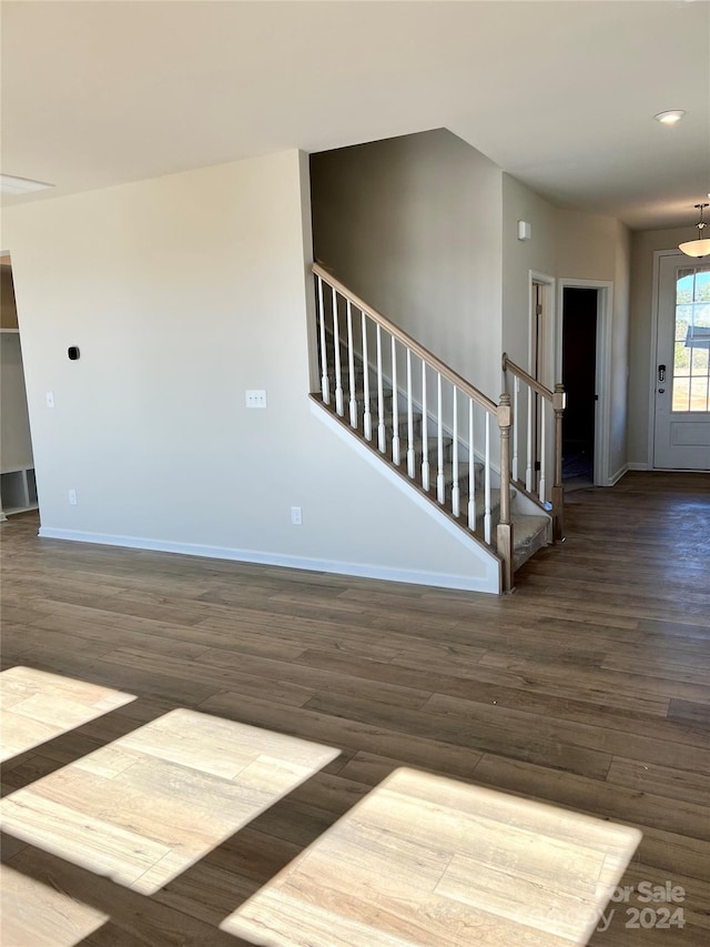 empty room featuring hardwood / wood-style flooring