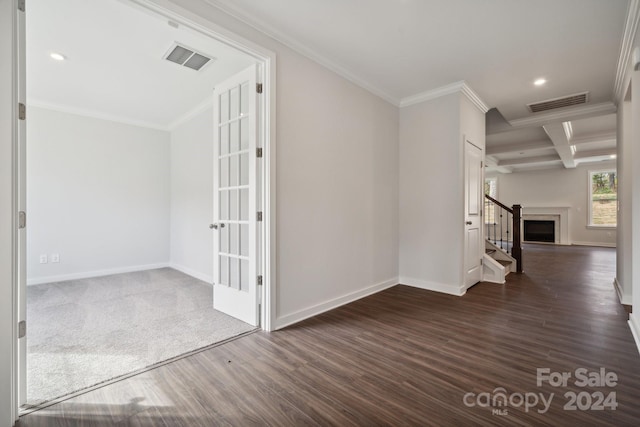 hall with dark hardwood / wood-style floors, crown molding, beam ceiling, and coffered ceiling