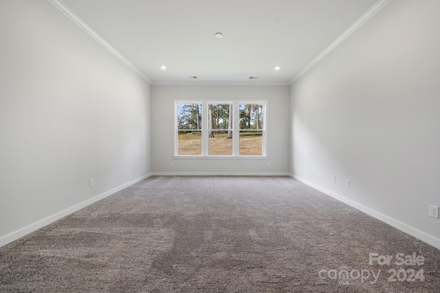 carpeted empty room with recessed lighting, baseboards, and ornamental molding