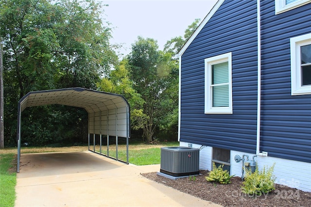 exterior space with a carport