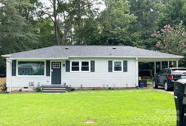 ranch-style house with a carport, a front lawn, crawl space, and roof with shingles