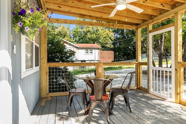 sunroom / solarium with ceiling fan