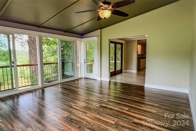 interior space featuring ceiling fan, a healthy amount of sunlight, and vaulted ceiling