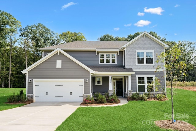 craftsman-style home with a front lawn